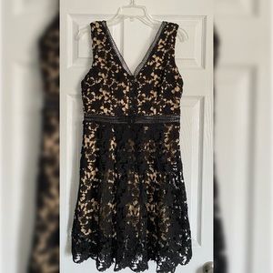 Black lace with nude underneath size medium